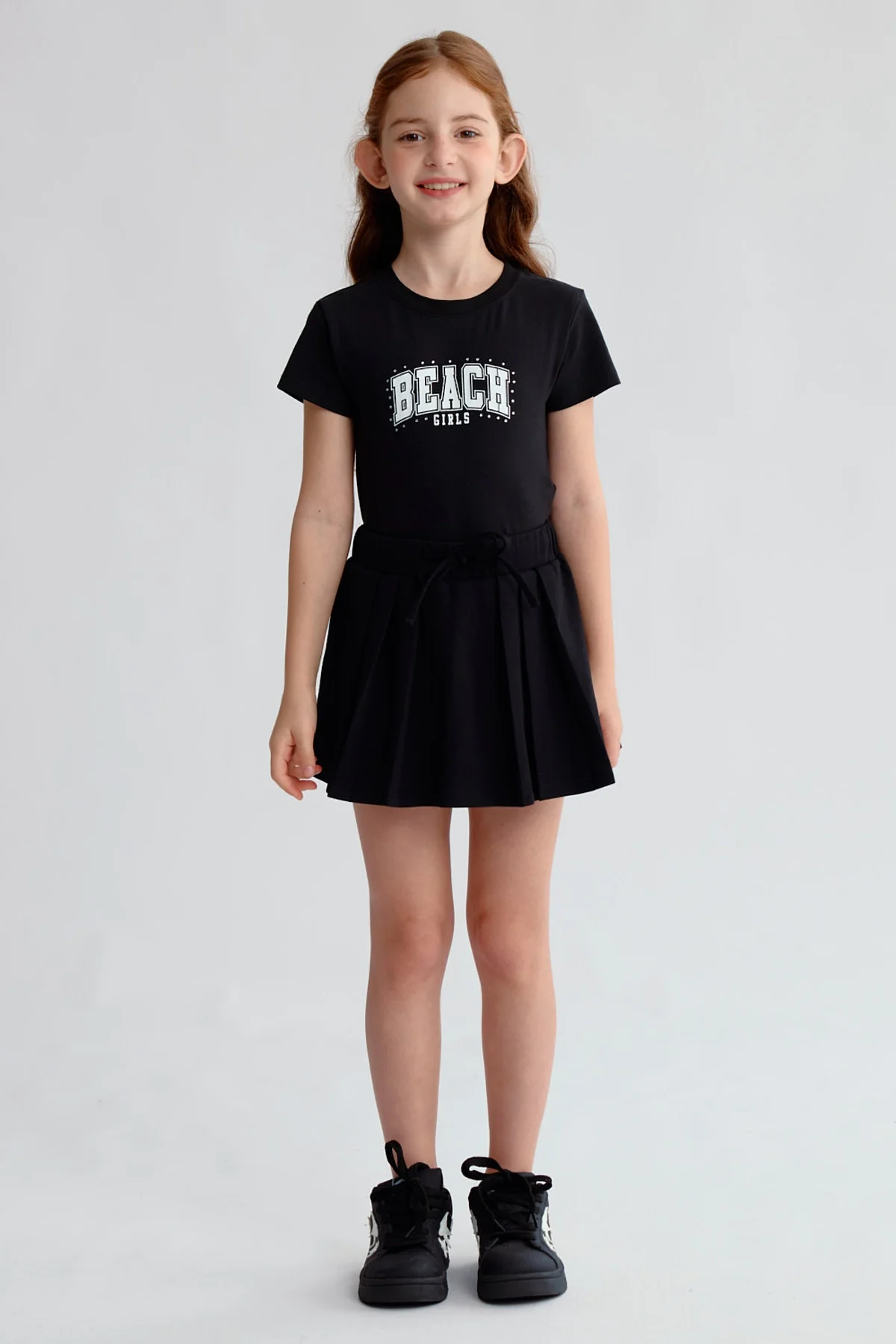 Falda Niña Tableada Con Lazo Negro - Image 4