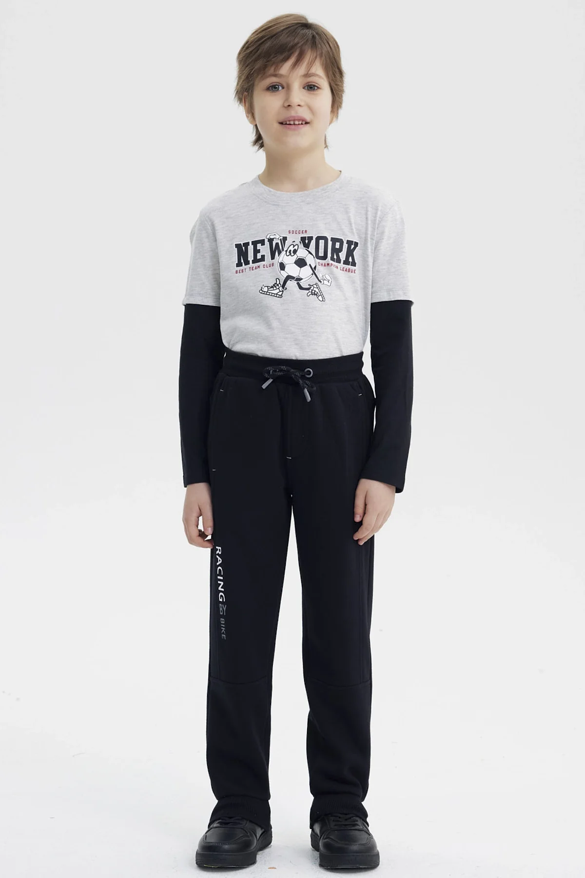Pantalón Buzo Niño Pitillo Negro - Image 4