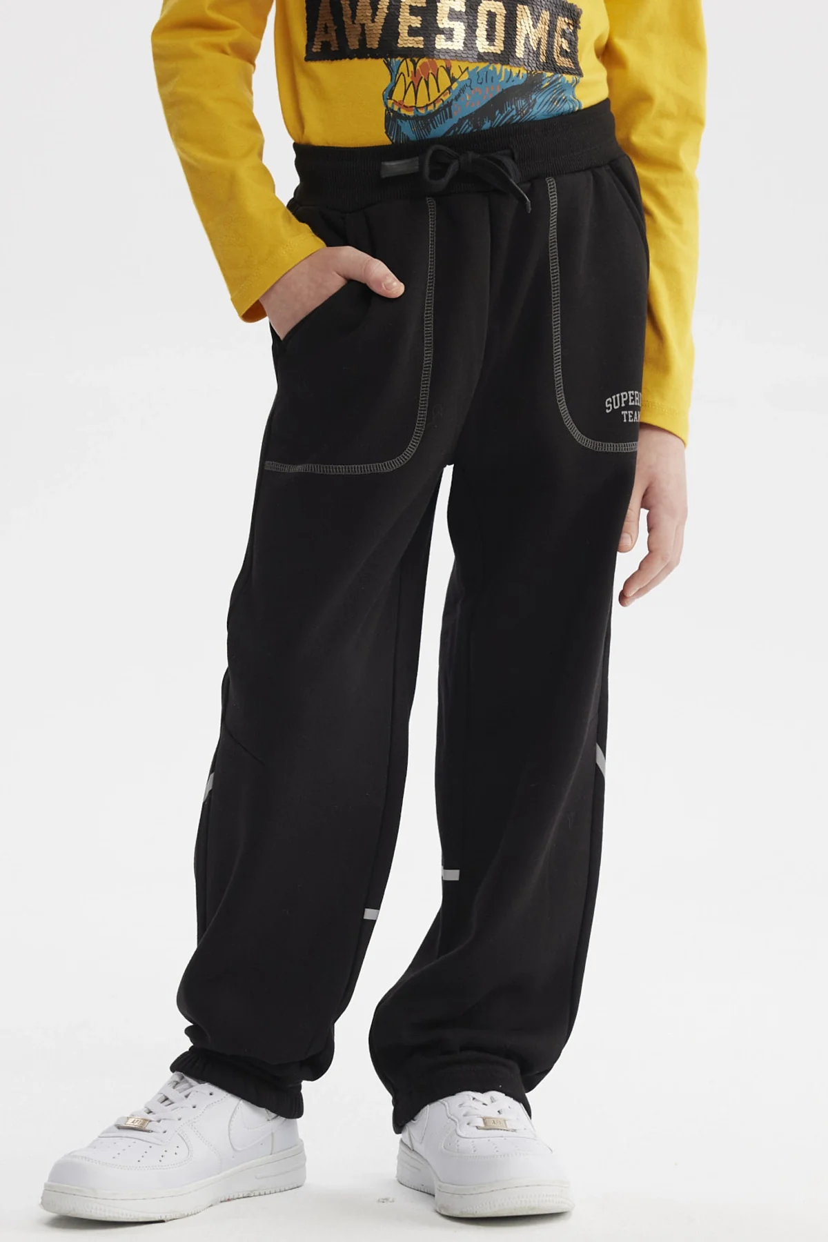 Pantalón Buzo Niño Pitillo Negro