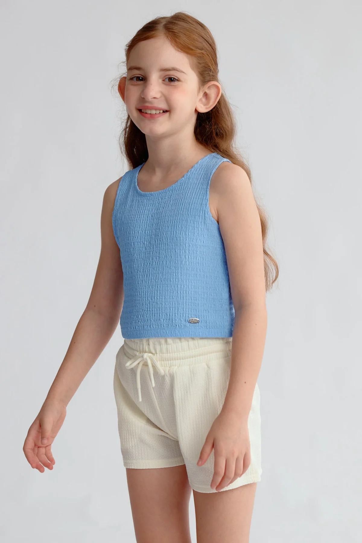 Polera Niña Textura Tipo Peto Celeste - Image 3